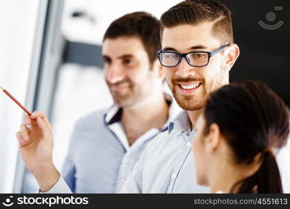 Business people in modern office. Business people working and discussing in modern office