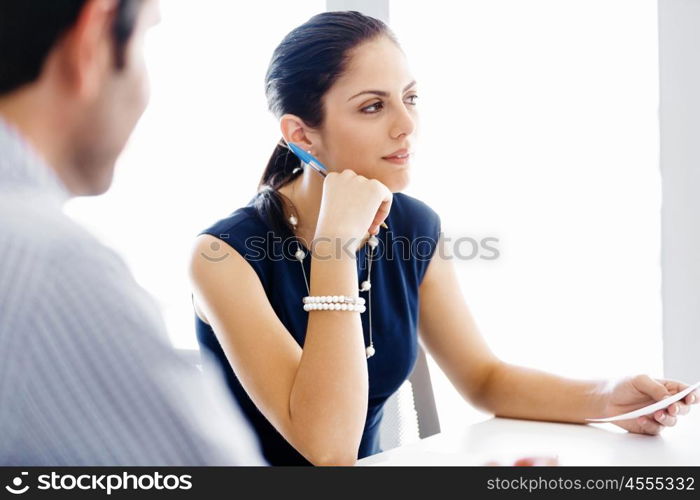 Business people in modern office. Business people working and discussing in modern office