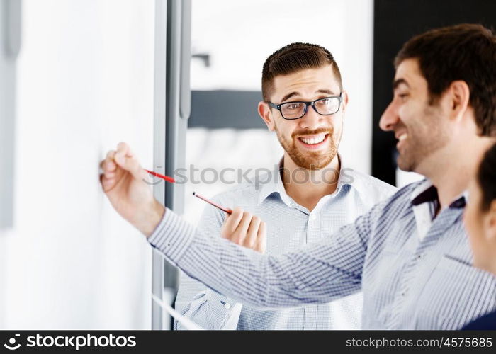 Business people in modern office. Business people working and discussing in modern office