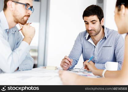 Business people in modern office. Business people working and discussing in modern office