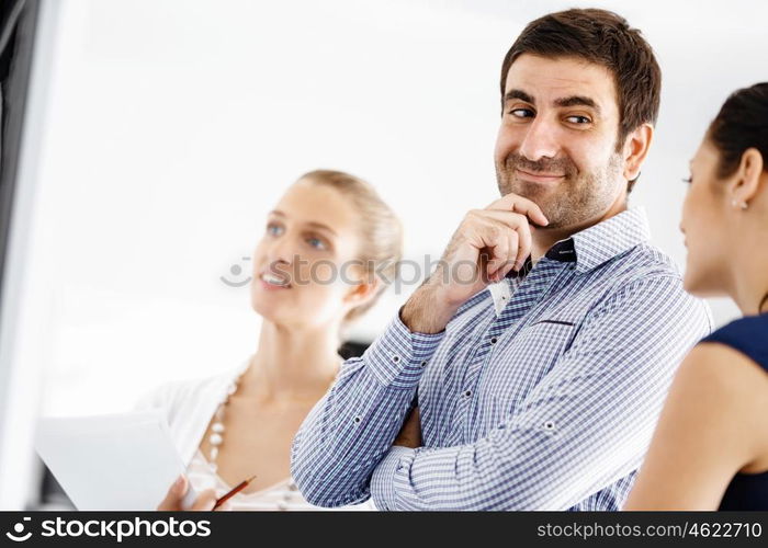 Business people in modern office. Business people working and discussing in modern office