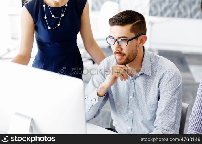 Business people in modern office. Business people working and discussing in modern office