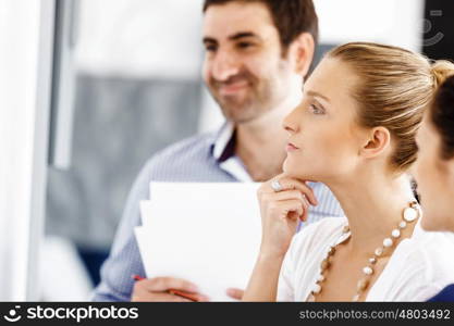 Business people in modern office. Business people working and discussing in modern office