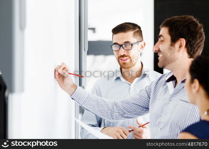 Business people in modern office. Business people working and discussing in modern office