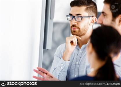 Business people in modern office. Business people working and discussing in modern office