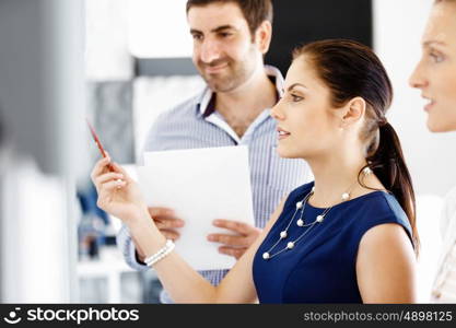 Business people in modern office. Business people working and discussing in modern office