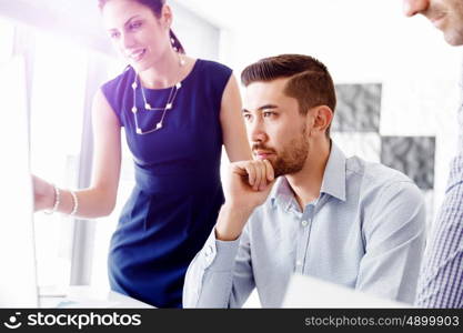 Business people in modern office. Business people working and discussing in modern office