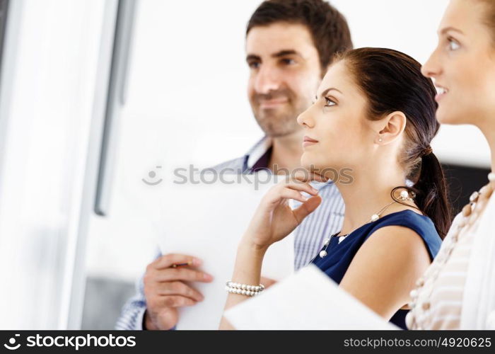 Business people in modern office. Business people working and discussing in modern office