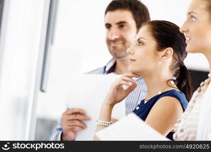 Business people in modern office. Business people working and discussing in modern office