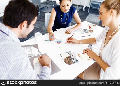 Business people in modern office. Business people working and discussing in modern office