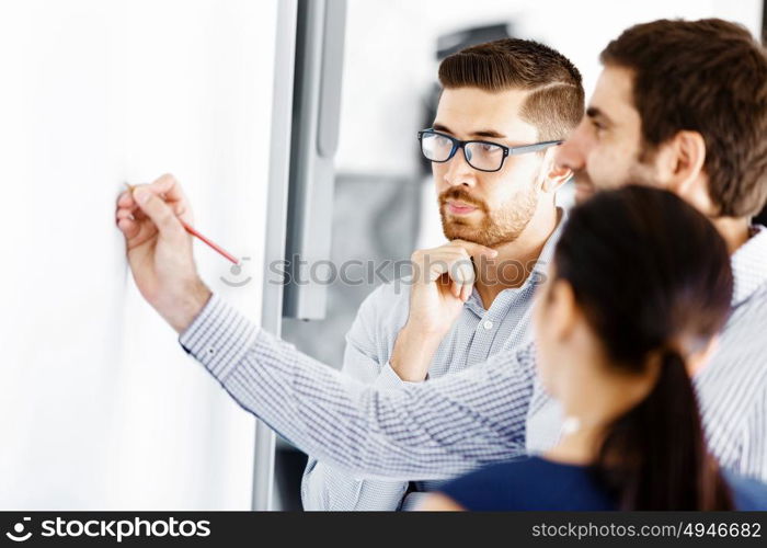 Business people in modern office. Business people working and discussing in modern office