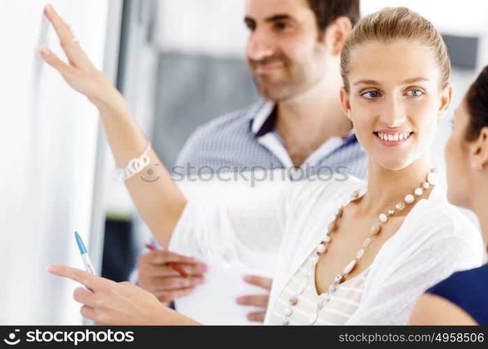 Business people in modern office. Business people working and discussing in modern office