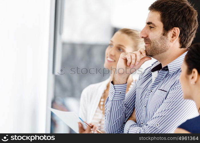 Business people in modern office. Business people working and discussing in modern office