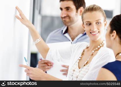 Business people in modern office. Business people working and discussing in modern office