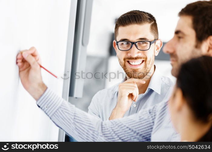 Business people in modern office. Business people working and discussing in modern office