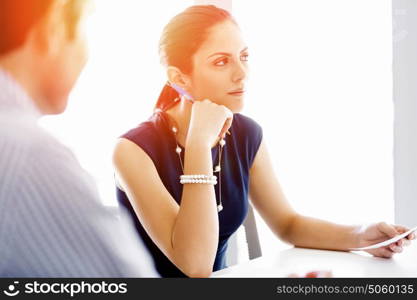 Business people in modern office. Business people working and discussing in modern office