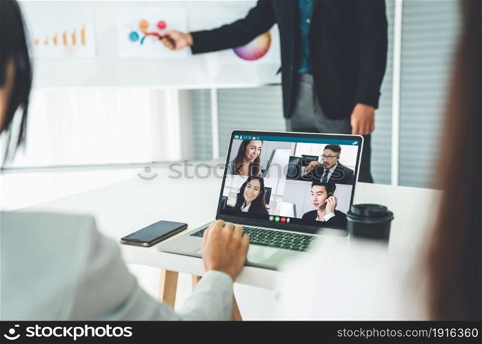 Business people in video call meeting proficiently discuss business plan in office and virual workplace . Telework conference call using smart video technology to communicate colleague .. Business Video Call
