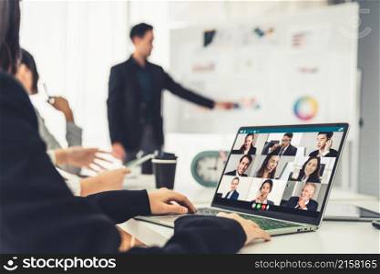 Business people in video call meeting proficiently discuss business plan in office and virual workplace . Telework conference call using smart video technology to communicate colleague .. Business people in video call meeting proficiently discuss business plan