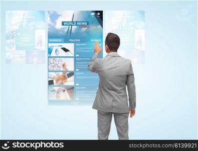 business, people, internet and mass media concept - businessman touching virtual projection with world news web page from back