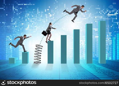 Business people jumping over bar charts