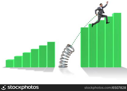 Business people jumping over bar charts