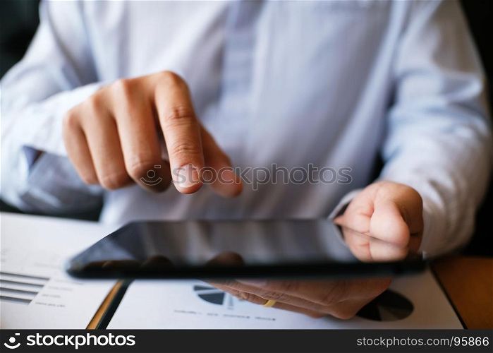 Business people making presentation with his colleagues and business tablet digital computer as meeting concept