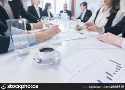 Business people meeting at office. Group of business people in meeting room at office discuss financial reports