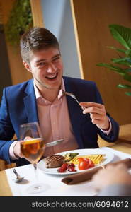 business people meeting in modern restaurant, romantic couple having dinner and take drink after work