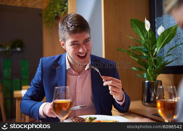 business people meeting in modern restaurant, romantic couple having dinner and take drink after work