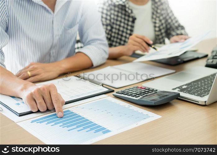 Business people meeting team analyzing financial documents at conference table, Corporate People Working Concept