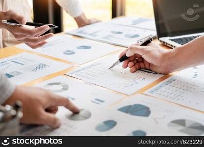 Business People Meeting to analyse and discuss and brainstorming the financial report chart data in office, Financial advisor teamwork and accounting concept