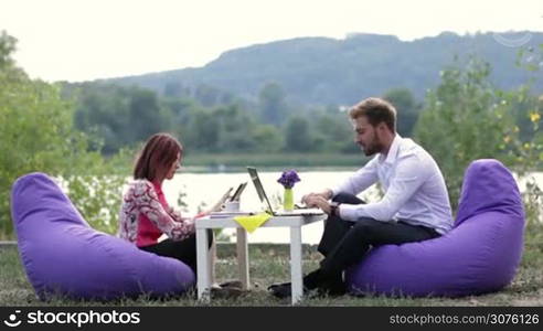 Business people meeting to discuss business plans and the situation on the market outdoors