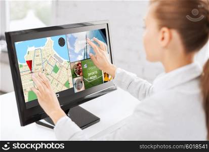 business, people, navigation and technology concept - woman with gps navigator map on computer touchscreen in office