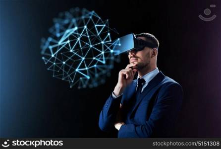 business, people, network, augmented reality and modern technology concept - businessman in virtual headset looking at low poly projection over black background. businessman in virtual reality headset