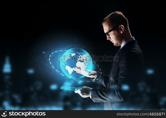 business, people, network, mass media and future technology concept - businessman with tablet pc computer and earth globe hologram over dark background