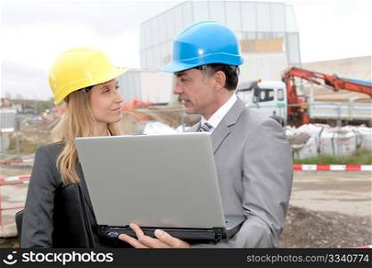 Business people on construction site
