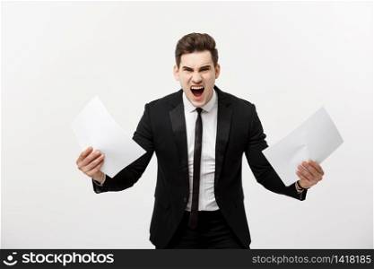 Business, people, paperwork and deadline concept - stressed handsome businessman with papers and charts show shocking facial expression with result.. Business, people, paperwork and deadline concept - stressed handsome businessman with papers and charts show shocking facial expression with result