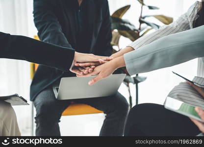 Business people proficiently celebrate project success at office workplace . Corporate business team collaboration concept .. Business people proficiently celebrate project success at office workplace