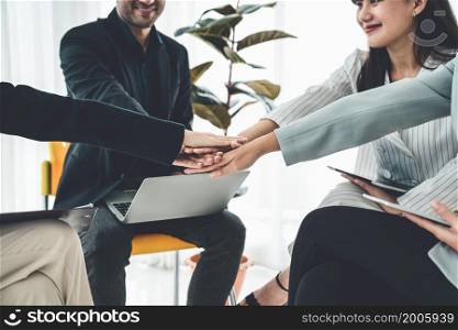 Business people proficiently celebrate project success at office workplace . Corporate business team collaboration concept .. Business people proficiently celebrate project success at office workplace
