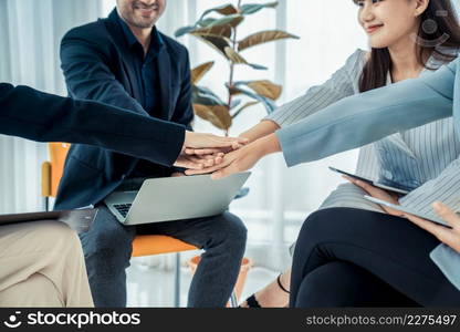 Business people proficiently celebrate project success at office workplace . Corporate business team collaboration concept .. Business people proficiently celebrate project success at office workplace