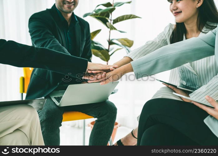 Business people proficiently celebrate project success at office workplace . Corporate business team collaboration concept .. Business people proficiently celebrate project success at office workplace