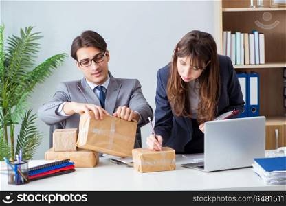 Business people receiving new mail and parcels