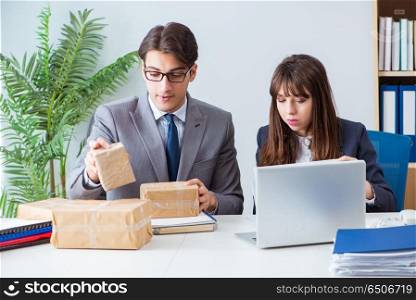 Business people receiving new mail and parcels