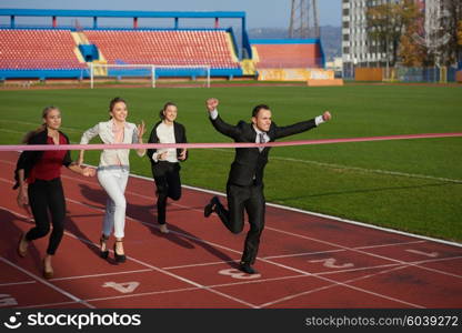 business people running together on racing track