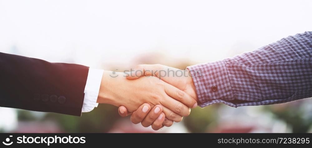 Business people shake hands together to do new business