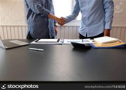 Business people shaking hands after meeting. colleagues handshaking after conference. Greeting deal, teamwork partnership cooperate concept.