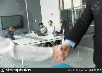 Business people shaking hands in the office