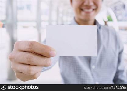 Business people show business cards