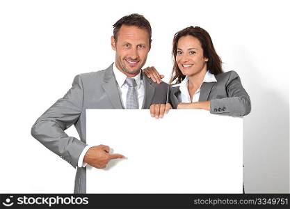 Business people showing message board