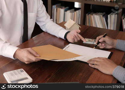 Business people signing contract making a deal with real estate agent Concept for consultant and home insurance concept